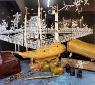 A Chinese model junk boat, boxed; four mother of pearl inlaid lacquered panels depicting empress