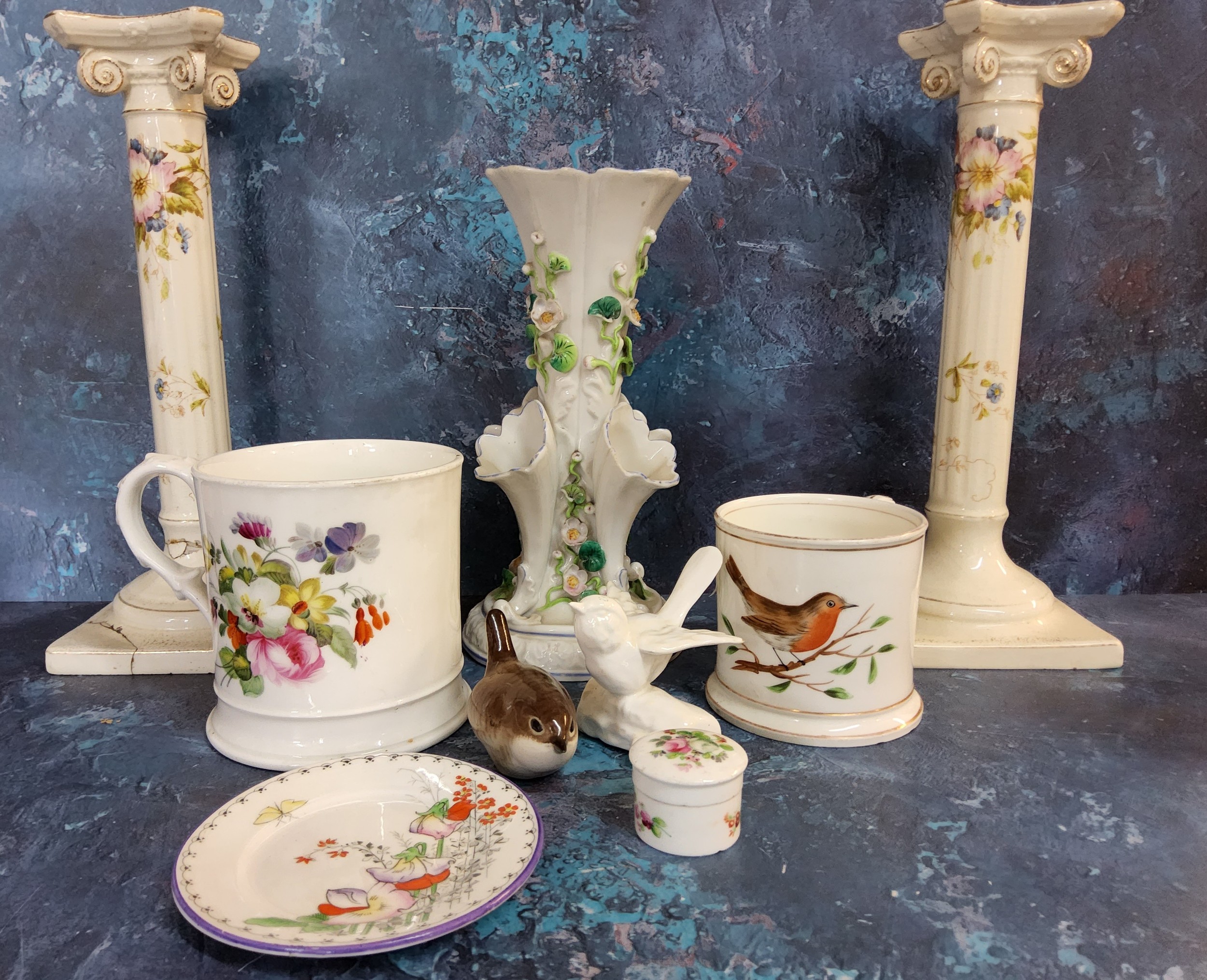 An English Porcelain mug, painted with colourful flowers, c.1860;  another, smaller, decorated