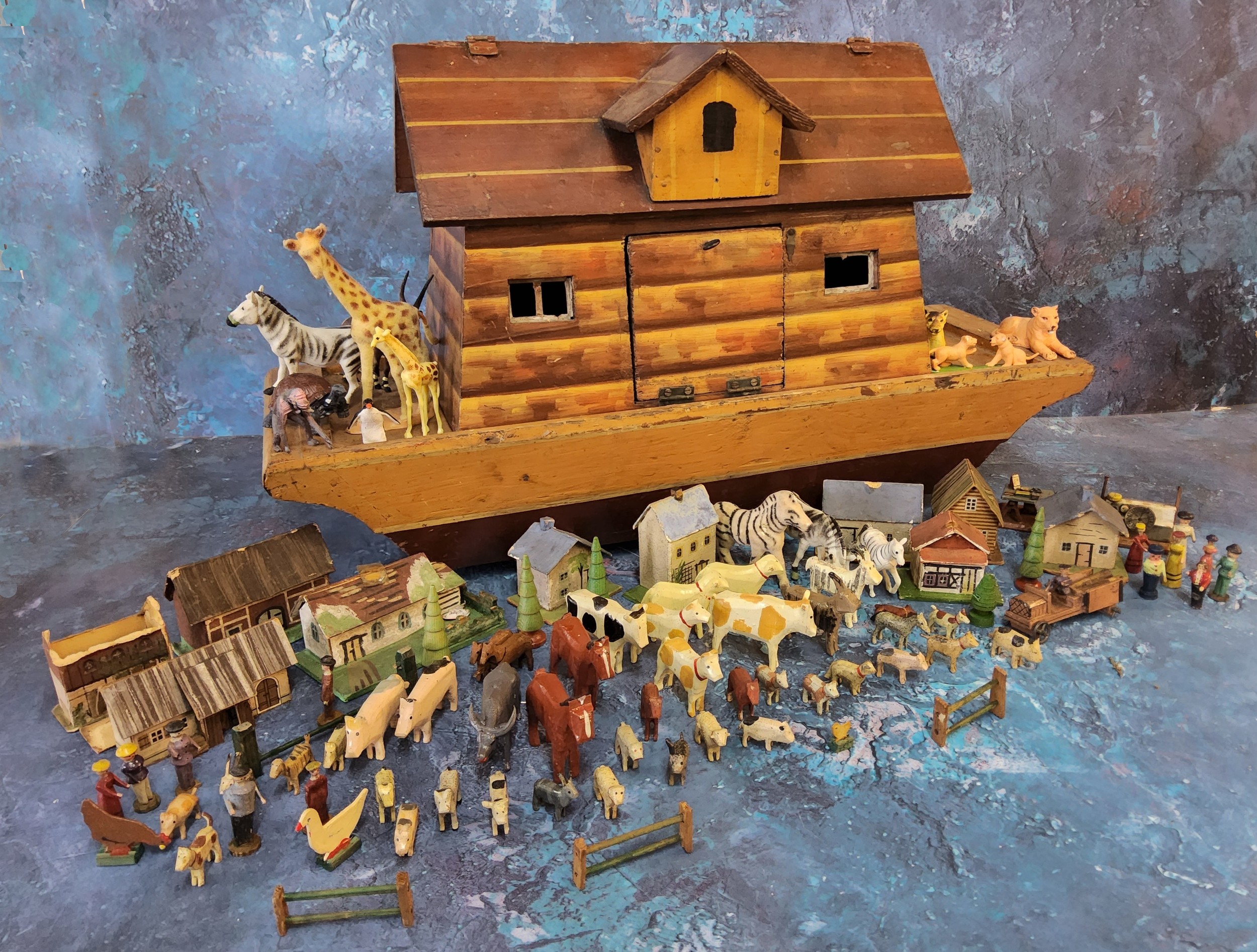 A mid 20th century wooden Noah's Arc, various animals and houses;  etc