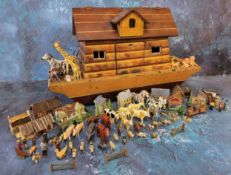A mid 20th century wooden Noah's Arc, various animals and houses;  etc