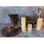 Tribal Art -  a treen waisted cylindrical pestle;  bone dagger hafts;  a Chinese hardwood stand;