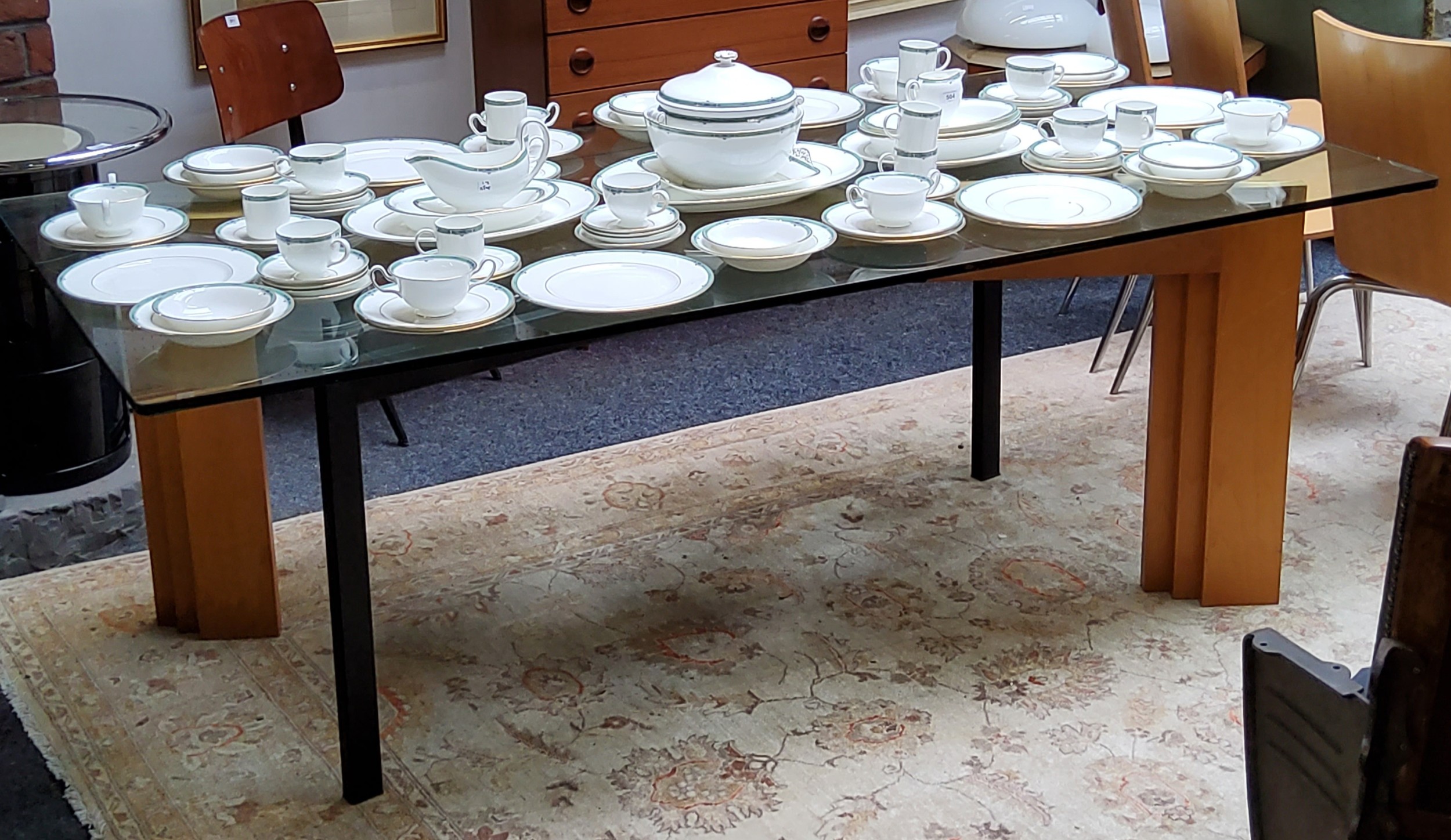 20th Century Design - a rectangular glass dining table, the stand half metal and wood stand, 72cm