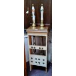 An 20th century beer pump, holding two ceramic pulls, complete with workings in a wooden housing,