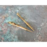 A Victorian yellow metal propelling pencil with vacant cartouche and a shield shaped agate terminal;