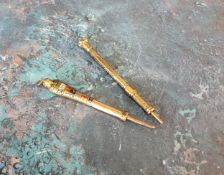 A Victorian yellow metal propelling pencil with vacant cartouche and a shield shaped agate terminal;