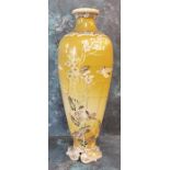 A Japanese satsuma slender ovoid vase, decorated with song birds perched on blossoming branches,