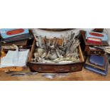 A large quantity of flatware, some cased;  carving set;  etc