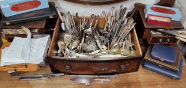 A large quantity of flatware, some cased;  carving set;  etc