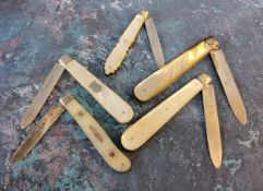 A Victorian mother-of-pearl and silver folding pen knife, Sheffield 1895;  others (4)