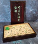 A Chinese bone and bamboo mahjong set, boxed