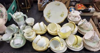 A Royal Albert tea service, for six, each printed with cowslips, yellow ground, printed marks;