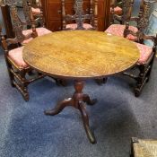 A 19th century oak circular occasional table, tripod legs, pad feet, 86cm diam, c.1800