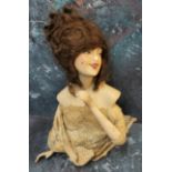 An early 20th century German Boudoir half doll, brown wig, open mouth, 15cm high, triangle mark