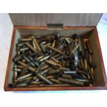 A collection of bullet casings, various