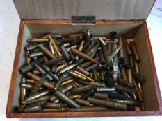 A collection of bullet casings, various