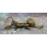 An bronze model, of a dachshund, 8cm long;  a snail, 7.5cm long;  a mouse (3)