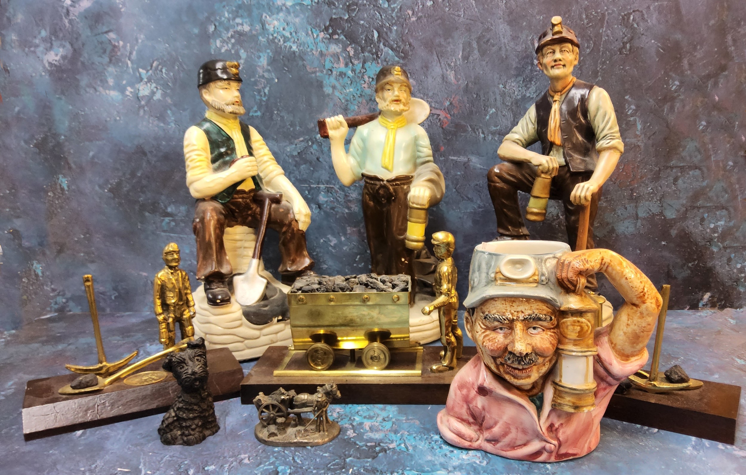 Cymru Welsh Mining Memorabilia - brass and coal models;  a coal model of terrier;  pottery models of