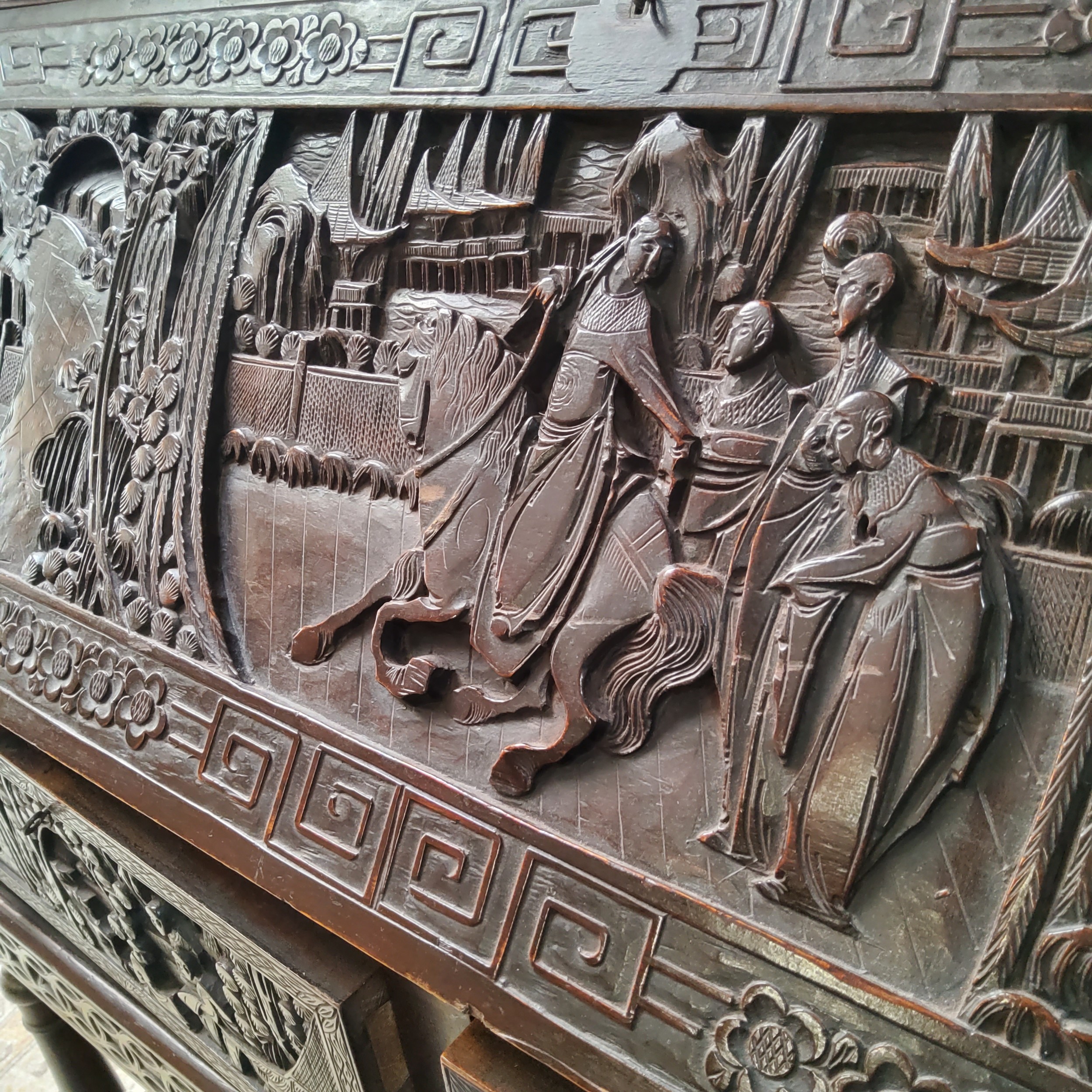 A late 19th / early 20th century carved padouk wood scholar's bureau on stand, profusely carved with - Image 2 of 3