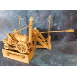 A Timberkit mechanical model of Stephenson's Rocket;  another, Catapult (2)