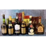 A bottle of Hennessy fine champagne VSOP cagnac; Martell cognac; E&J brandy; Napoleon pure grape