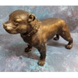 A bronzed spelter model of a Staffordshire Bull Terrier, 20cms high