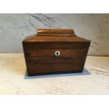 A Victorian rosewood sarcophagus shaped tea caddy, twin compartment, 13.5cm high, 19cm wide, c.1860