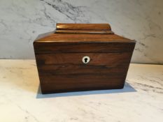 A Victorian rosewood sarcophagus shaped tea caddy, twin compartment, 13.5cm high, 19cm wide, c.1860