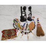 African Art - ebonised figures;  beadwork brush, horn and and spear;  a porcupine and bead necklace;