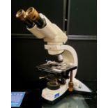A Leica DM LS2  electronic microscope, Type 11 020 518 110, 45cm high