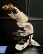 A Leica DM LS2  electronic microscope, Type 11 020 518 110, 45cm high