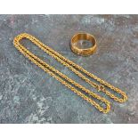 A 9ct gold buckle ring, size W; a 9ct gold 18" rope chain; 11.5g total
