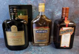 A Courvoisier Fine Champagne VSOP cognac, boxed; a Martell VS fine cognac; a 0,70l bottle of