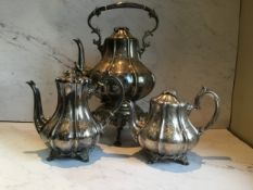 A Victorian part E.P.N.S. tea service, of fluted baluster form, comprising tea kettle on stand,