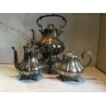 A Victorian part E.P.N.S. tea service, of fluted baluster form, comprising tea kettle on stand,