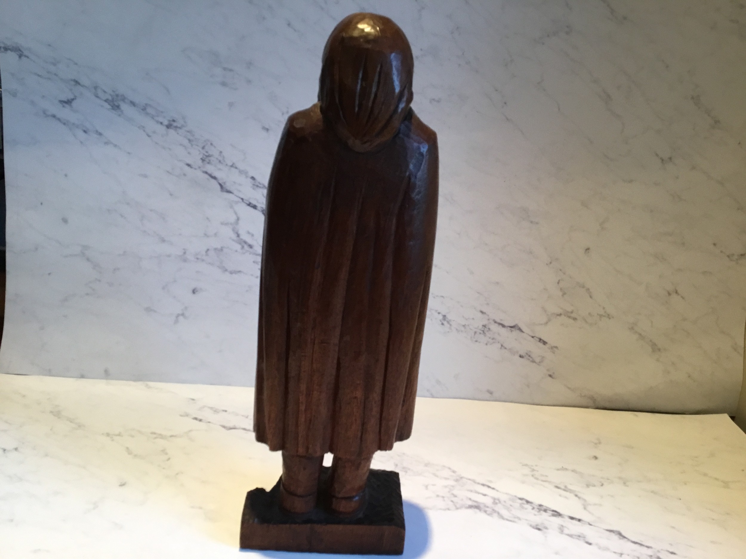 A 19th century hardwood carving, of a bearded man, wearing a hood cloak, 41cm high, c.1880 - Image 4 of 4