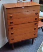 A mid 20th century teak chest,  of five long drawers,  c.1960