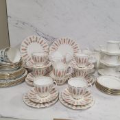 A Royal Albert Safari pattern tea and dinner service, for six, printed marks;  a set of six Wedgwood
