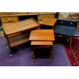 A mid 20th century teak telephone seat;  a nest of two G plan side tables; a teak trolley (3)