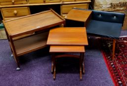 A mid 20th century teak telephone seat;  a nest of two G plan side tables; a teak trolley (3)