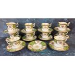 A Coalport coffee service, for ten, printed and painted with flowers, apple green border, picked out