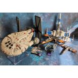 Star Wars collectibles including an E-Kids Millenium Falcon on stand; Hasbro Death Star, X-Wing