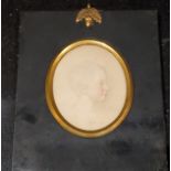 Victorian School, 1850, a portrait miniature, of a young child, watercolour, ebonised frame