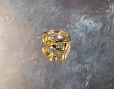 A 9ct gold 'Gucci' style stirrup ring, size L, Sheffield, 1994 5.1g (VAT on Hammer price)