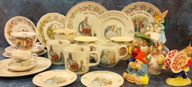 Wedgwood Peter Rabbit Christmas plates, 1991, 1992;  Royal Doulton Bramley Hedge Winter teacup,