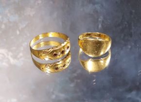 An 18ct gold 'pinkie' signet ring, size I 1/2, 2.7g; a late Victorian 15ct gold ring, set with three