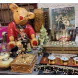 Interior Design - a large papier mache teddy bear, seated;  Coca Cola wine bucket;  chess board;