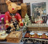 Interior Design - a large papier mache teddy bear, seated;  Coca Cola wine bucket;  chess board;