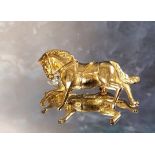 A 9ct gold novelty brooch in the form of a bridled horse cantering 11.33g (VAT on Hammer price)