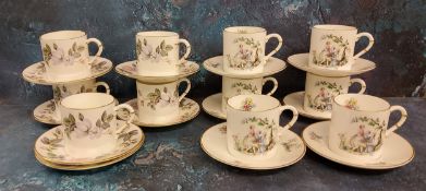 A set of six Royal Worcester Watteau pattern coffee cans and saucers, printed mark;  a set of five