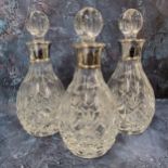 Three silver collared cut glass small decanters, sphere shaped cut glass stopper, James Dixon &